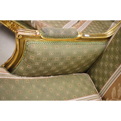 502 - Louis XV style Carved Gilt Wood Three Piece Suite comprising a three seater settee (230cm long x 113... 