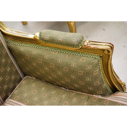 502 - Louis XV style Carved Gilt Wood Three Piece Suite comprising a three seater settee (230cm long x 113... 