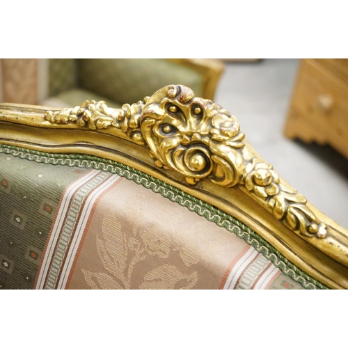 502 - Louis XV style Carved Gilt Wood Three Piece Suite comprising a three seater settee (230cm long x 113... 