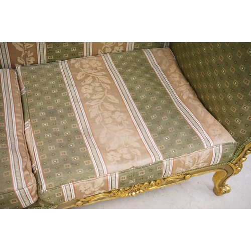 502 - Louis XV style Carved Gilt Wood Three Piece Suite comprising a three seater settee (230cm long x 113... 