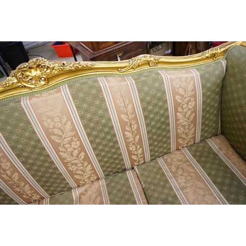 502 - Louis XV style Carved Gilt Wood Three Piece Suite comprising a three seater settee (230cm long x 113... 