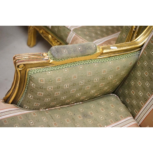 502 - Louis XV style Carved Gilt Wood Three Piece Suite comprising a three seater settee (230cm long x 113... 