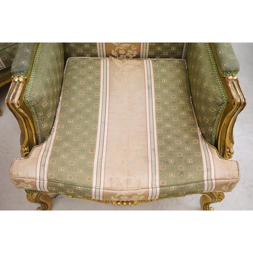 502 - Louis XV style Carved Gilt Wood Three Piece Suite comprising a three seater settee (230cm long x 113... 