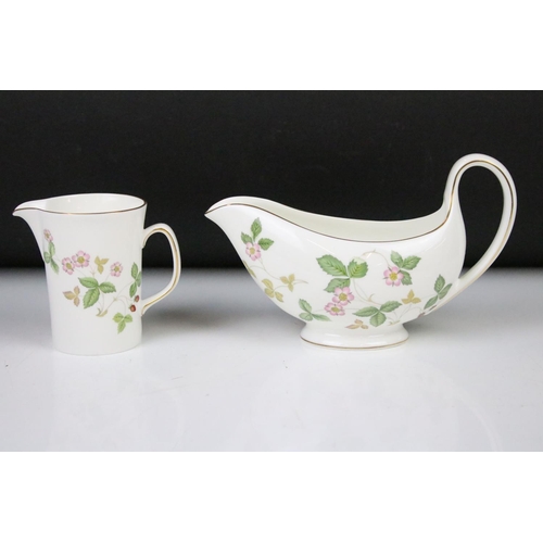 106 - Wedgwood 'Wild Strawberry' pattern tea & dinner ware, pattern no. R 4406, to include teapot & cover,... 