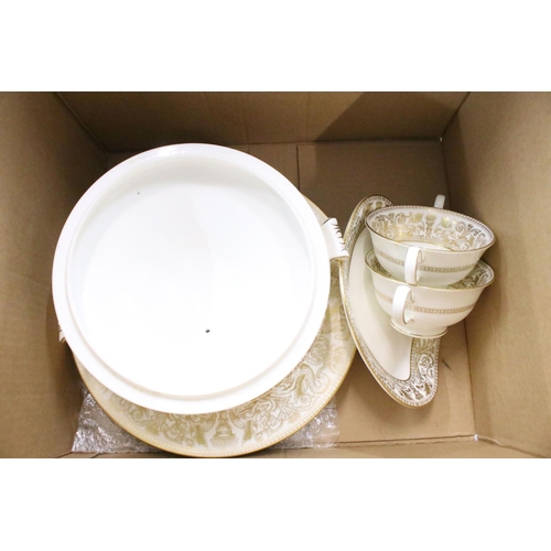 117 - Wedgwood 'Gold Florentine' part dinner service for 6 (pattern no. W4219), to include 2 tureens & cov... 