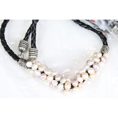 277 - Collection of approximately 50 costume jewellery seed pearl necklaces on leather straps