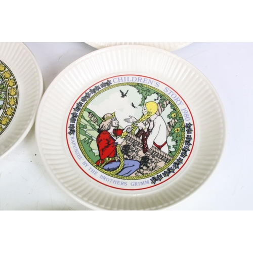 282 - A small box of mixed collectables to include a set of six Wedgwood children stories collectors plate... 