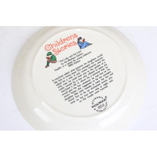 282 - A small box of mixed collectables to include a set of six Wedgwood children stories collectors plate... 