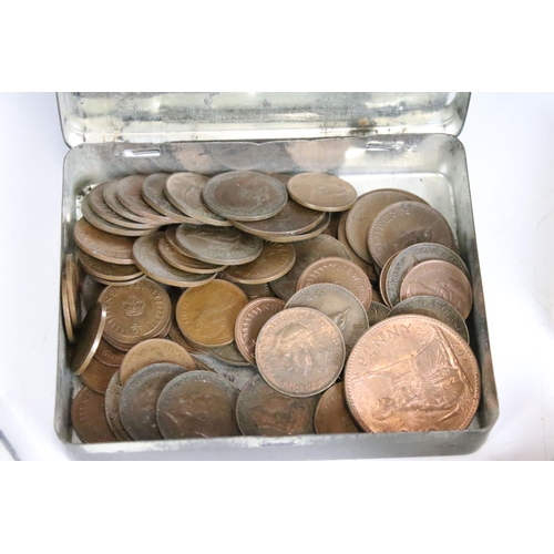 283 - A small group of mixed collectables to include coins, tokens, commemorative crowns and a vintage Tis... 