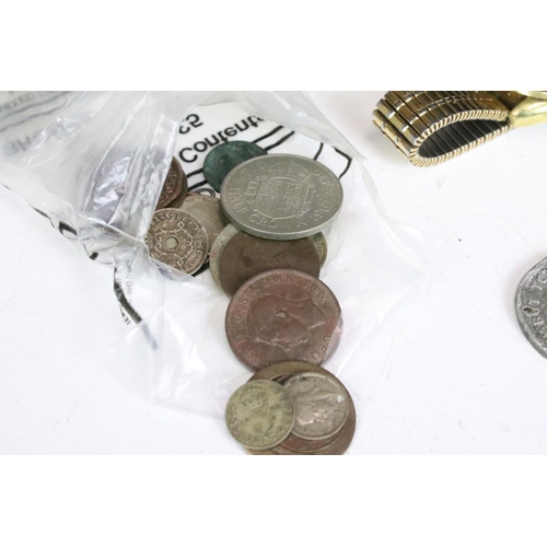 283 - A small group of mixed collectables to include coins, tokens, commemorative crowns and a vintage Tis... 