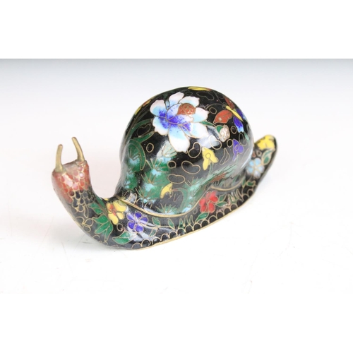 296 - A small box of mixed collectables to include a pair of cast metal elephants, two cloisonné figures a... 