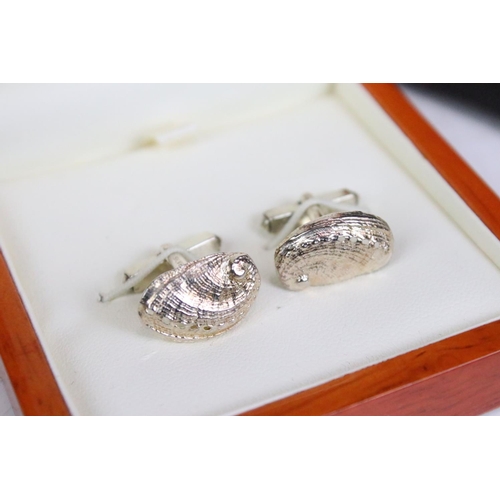 301 - A collection of mixed cufflinks to include hallmarked silver examples together with tie clip and tie... 