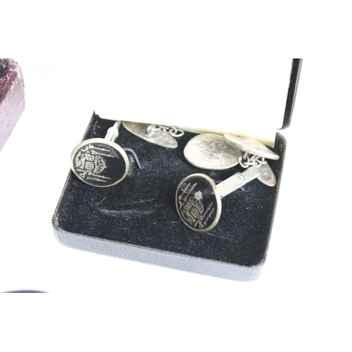 301 - A collection of mixed cufflinks to include hallmarked silver examples together with tie clip and tie... 