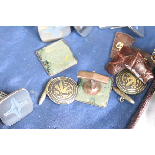 301 - A collection of mixed cufflinks to include hallmarked silver examples together with tie clip and tie... 