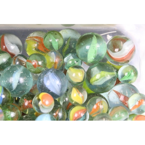 303 - A mixed collection of marbles to include various sizes and colours.