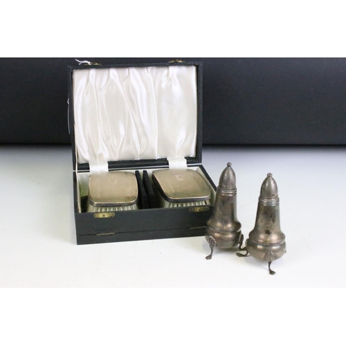 304 - A pair of fully hallmarked sterling silver brushes within fitted display case together with a pair o... 