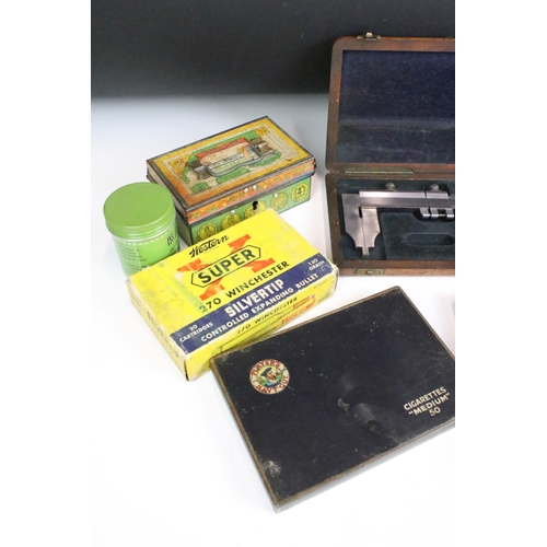 313 - A small collection of vintage tin boxes to include Players and Kensitas examples.