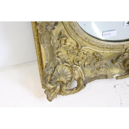 458 - 19th century Wall Mirror with circular plate, the gilt and gesso frame with moulded swept and scroll... 