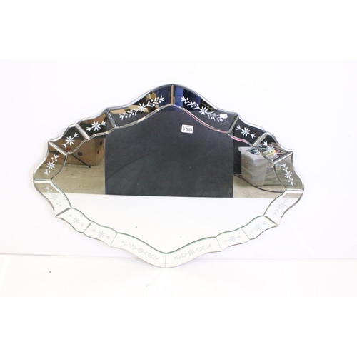 459A - 20th century Venetian style shaped Wall Mirror, the mirrored panel frame with bevelled edges and flo... 