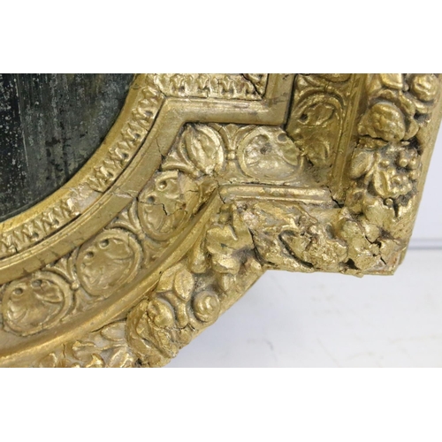 462 - 19th century Italian style shaped Wall Mirror held with a Floral Carved Giltwood and Gesso Frame, 10... 