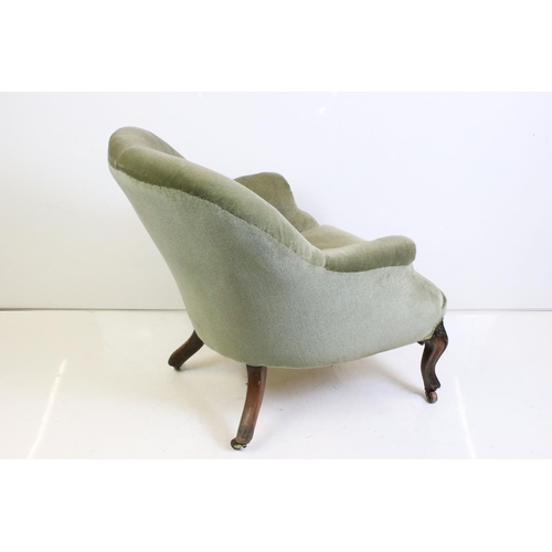 497 - 19th century Green Button Back Upholstered Tub Armchair, raised on carved front legs with castors, 6... 