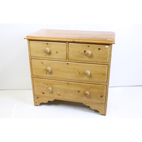 520 - Victorian Pine Chest of Two Short over two long drawers, with turned knob handles and raised on brac... 