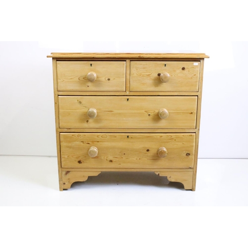 520 - Victorian Pine Chest of Two Short over two long drawers, with turned knob handles and raised on brac... 