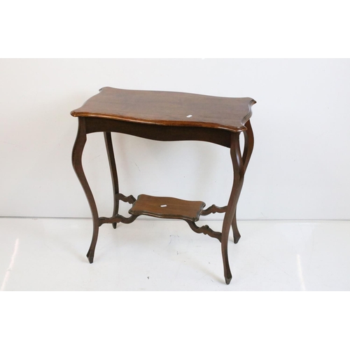 541 - Early 20th century Mahogany Side Table with shaped top, raised on cabriole legs united by a cross-st... 