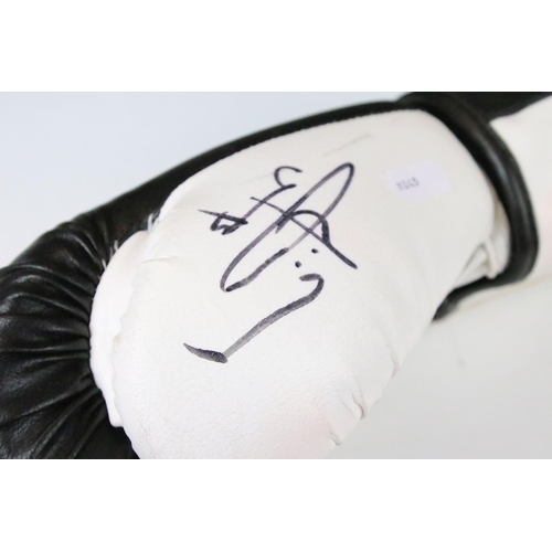 597 - Pair of Ringside 16-oz Black and White Boxing Gloves, signed