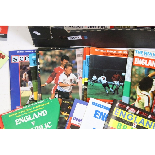 599 - A collection of 120 England home and away football programmes mainly from the 1960s onwards but a fe... 