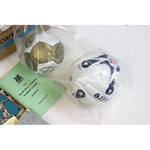 604 - Football memorabilia boxes, comprises of sticker albums, coin collections, assorted handbook, annual... 