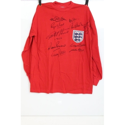 606 - England World Cup 1966 Classic Replica Shirt / Jersey signed by eleven members of the squad includin... 