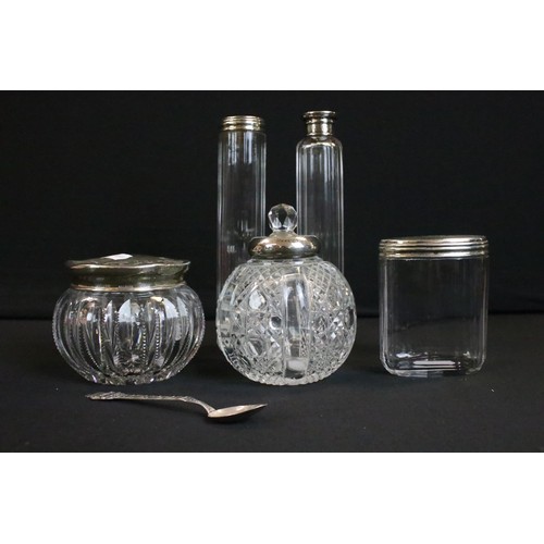 256 - A box of mixed vanity collectables to include fully hallmarked sterling silver topped jars.