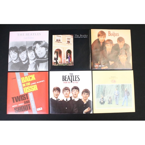 91 - Vinyl - The Beatles Singles Collection. Original UK 1982 26 7” singles box set on Parlophone Records... 