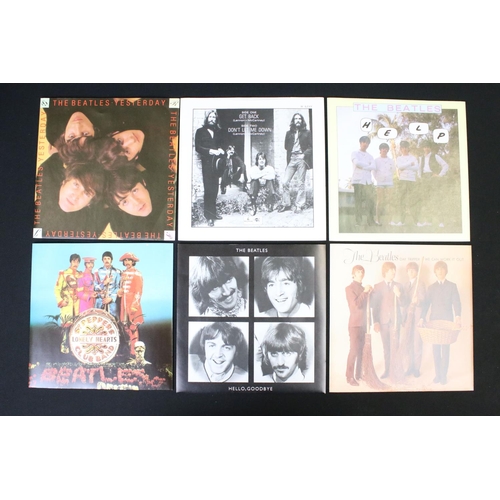 91 - Vinyl - The Beatles Singles Collection. Original UK 1982 26 7” singles box set on Parlophone Records... 