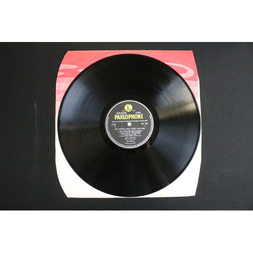 388 - Vinyl - 2 stereo copies of The Beatles Sgt Pepper (PCS 7027).  The Gramophone Co Ltd and Sold In The... 