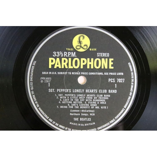 388 - Vinyl - 2 stereo copies of The Beatles Sgt Pepper (PCS 7027).  The Gramophone Co Ltd and Sold In The... 