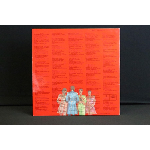 388 - Vinyl - 2 stereo copies of The Beatles Sgt Pepper (PCS 7027).  The Gramophone Co Ltd and Sold In The... 