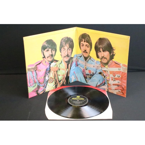 388 - Vinyl - 2 stereo copies of The Beatles Sgt Pepper (PCS 7027).  The Gramophone Co Ltd and Sold In The... 