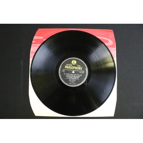 388 - Vinyl - 2 stereo copies of The Beatles Sgt Pepper (PCS 7027).  The Gramophone Co Ltd and Sold In The... 