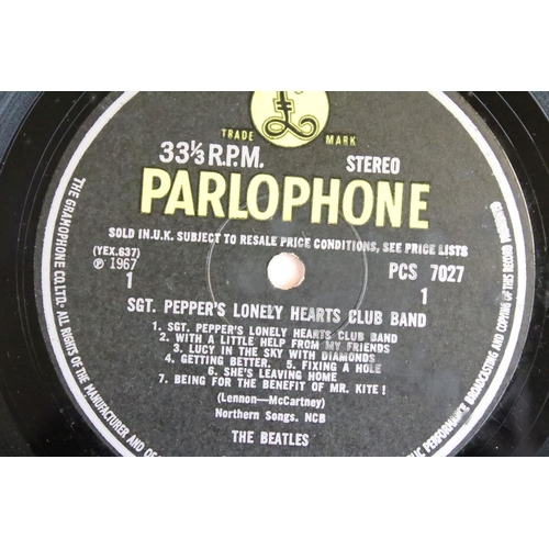 388 - Vinyl - 2 stereo copies of The Beatles Sgt Pepper (PCS 7027).  The Gramophone Co Ltd and Sold In The... 