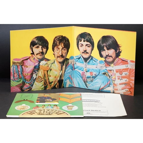 352 - Vinyl - 2 stereo copies of The Beatles Sgt Pepper (PCS 7027).  Two boxed EMI black & silver label re... 