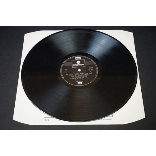 352 - Vinyl - 2 stereo copies of The Beatles Sgt Pepper (PCS 7027).  Two boxed EMI black & silver label re... 