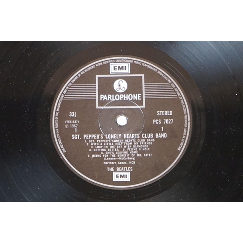 352 - Vinyl - 2 stereo copies of The Beatles Sgt Pepper (PCS 7027).  Two boxed EMI black & silver label re... 