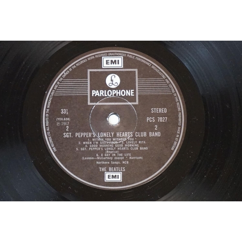 352 - Vinyl - 2 stereo copies of The Beatles Sgt Pepper (PCS 7027).  Two boxed EMI black & silver label re... 