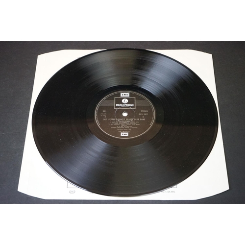 352 - Vinyl - 2 stereo copies of The Beatles Sgt Pepper (PCS 7027).  Two boxed EMI black & silver label re... 