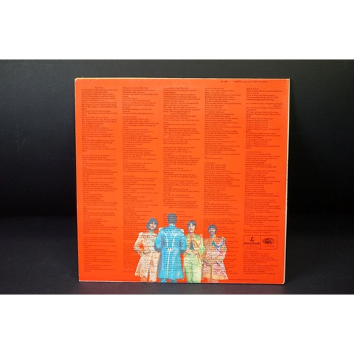 352 - Vinyl - 2 stereo copies of The Beatles Sgt Pepper (PCS 7027).  Two boxed EMI black & silver label re... 