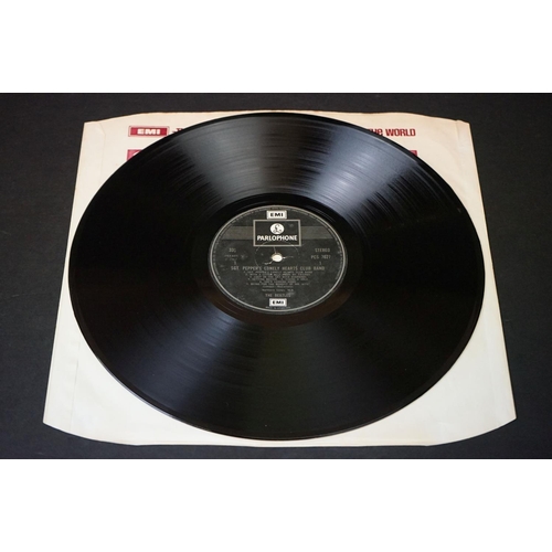 352 - Vinyl - 2 stereo copies of The Beatles Sgt Pepper (PCS 7027).  Two boxed EMI black & silver label re... 