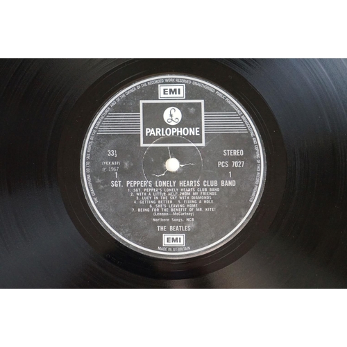 352 - Vinyl - 2 stereo copies of The Beatles Sgt Pepper (PCS 7027).  Two boxed EMI black & silver label re... 