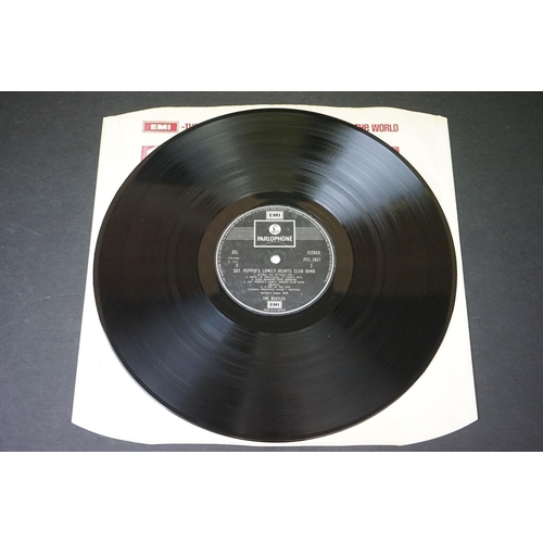 352 - Vinyl - 2 stereo copies of The Beatles Sgt Pepper (PCS 7027).  Two boxed EMI black & silver label re... 